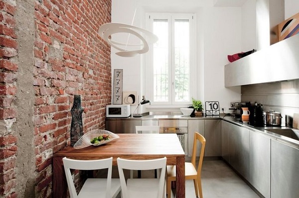 mini appartamento a Milano - cucina con mattoni a vista